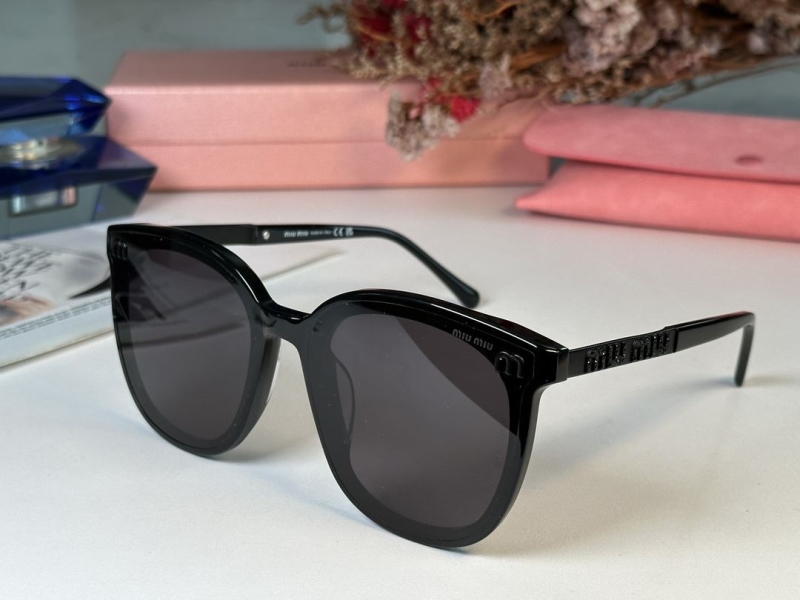 Miu miu Sunglasses